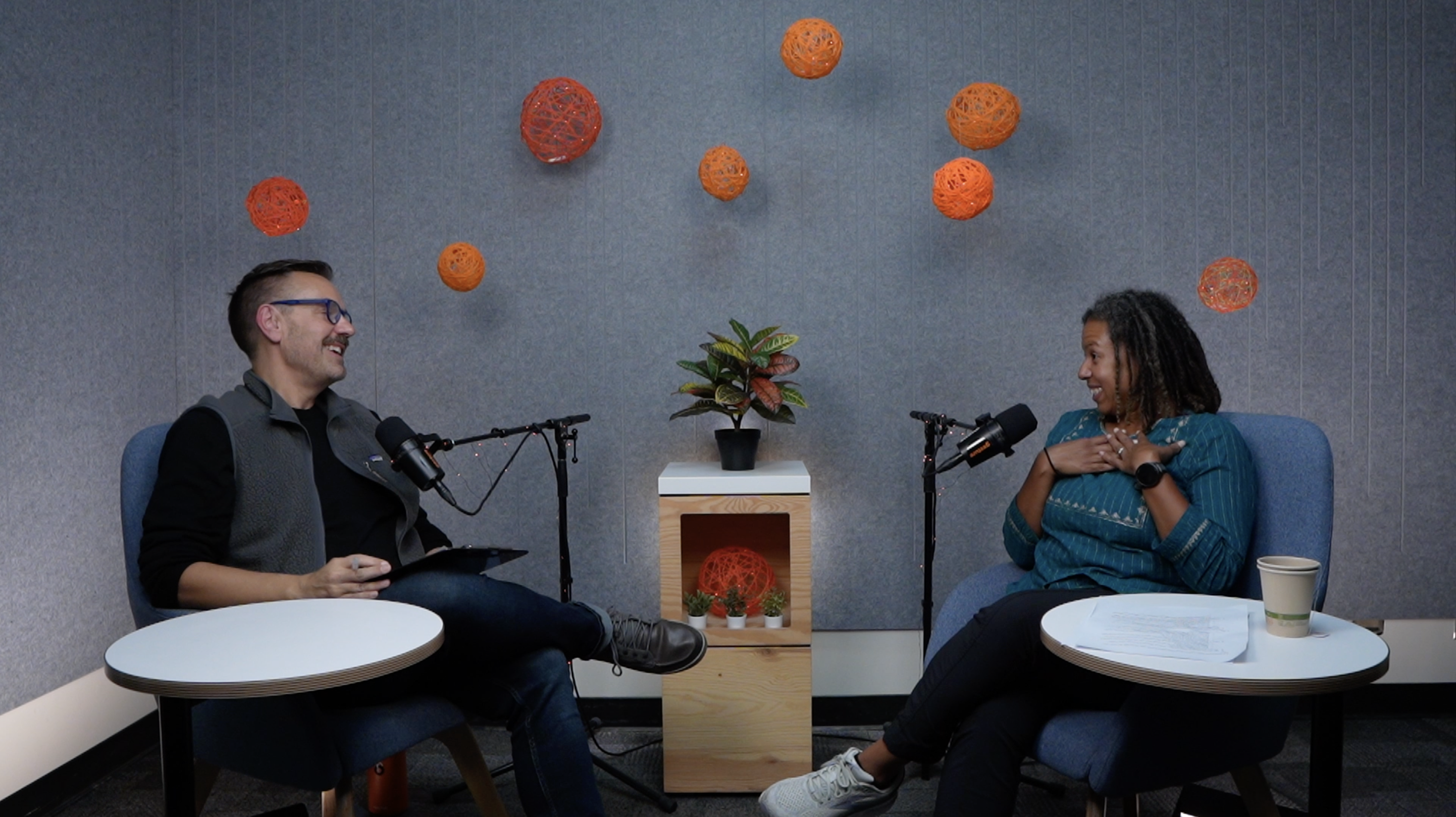 Professor Maya Smith and Matt Erickson chatting on Learning With podcast set