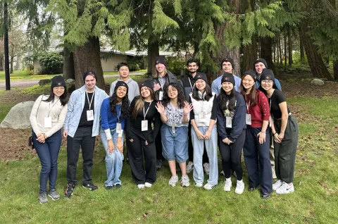student leaders taking a group photo outside